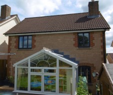 Contemporary Aluminium replacing wooden windows and doors