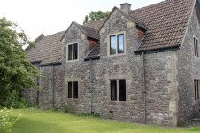 Slimline Aluminium windows in stone mullions