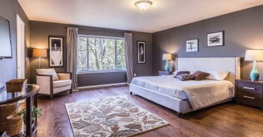 a furnished room with double glazing windows